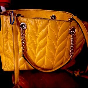 Kate Spade authentic yellow gold purse.